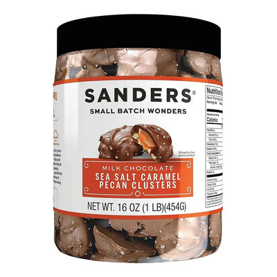 Jar of Sanders Milk Chocolate Sea Salt Caramel Pecan Clusters on a white background